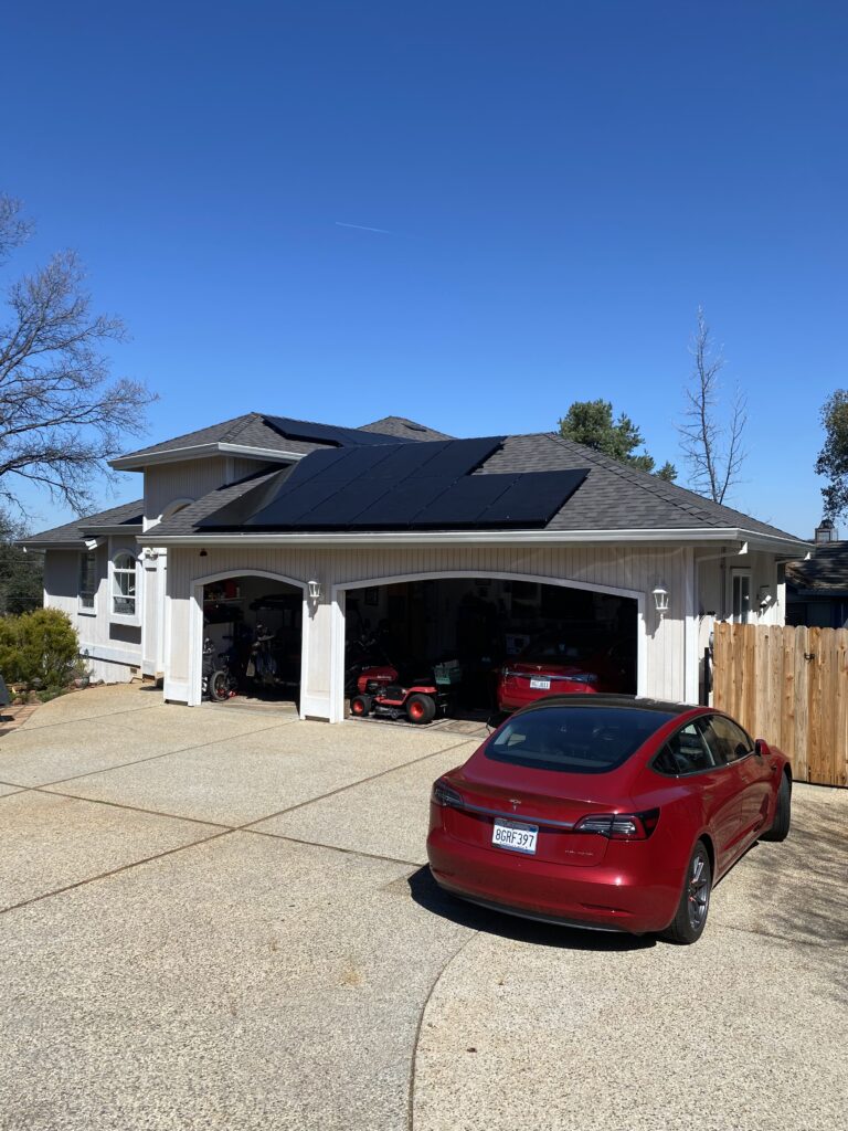 Two Tesla Model 3's powered entirely by a solar and battery system.